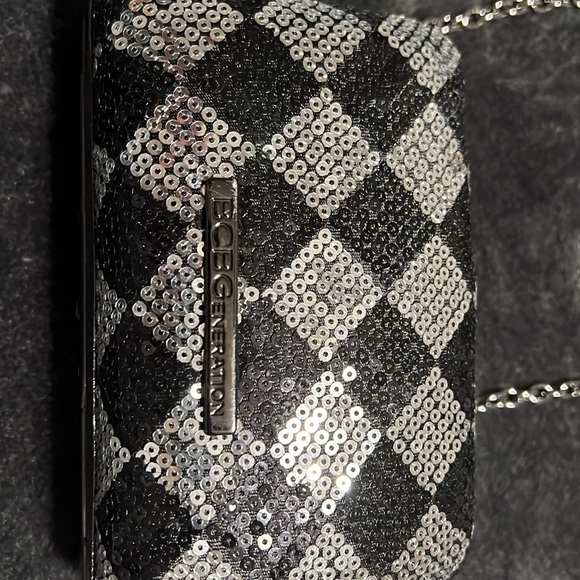 NWOT BCBGeneration Cocktail Purse. Black & Silver sequins with 24” strap. - Picture 2 of 7